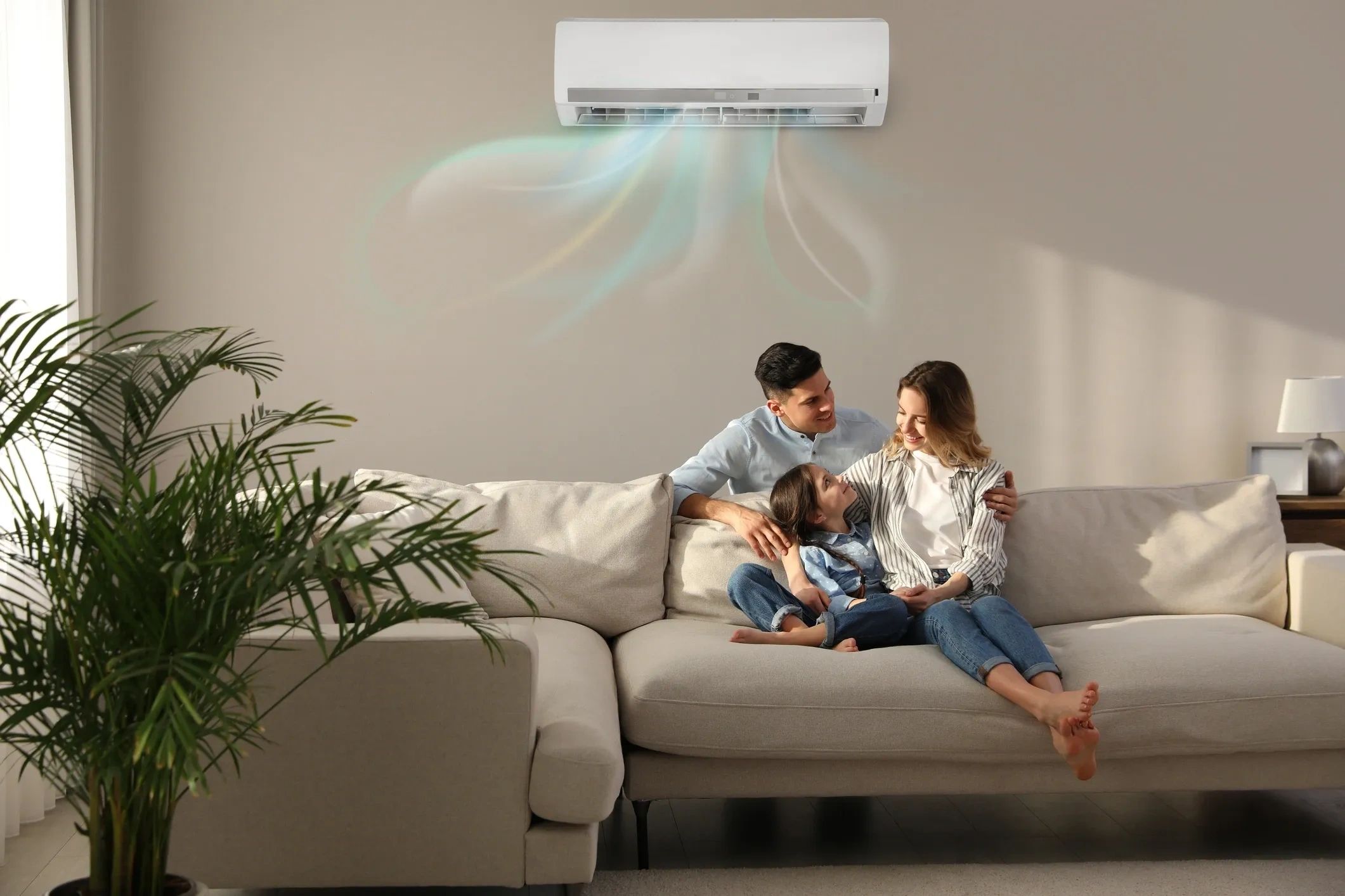Family sitting comfortably with air conditioning